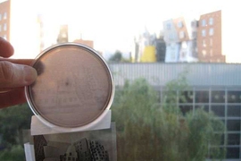 A bacterial photograph of the Stata Center. The bacterial strain was engineered to be sensitive to light, allowing the cells to serve as pixels in a photograph. Originally developed in the lab of Chris Voigt, the strain is used in the BioBuilder curriculum to illustrate the usefulness of modeling synthetic systems. Teachers can take photographs using the strain — as illustrated in this image of ...
