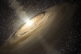 This artist's rendering shows a solar system that is a much younger version of our own. Dusty disks, like the one shown here circling the star, are thought to be the breeding grounds of planets, including rocky ones like Earth.