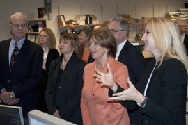Congresswoman Nancy Pelosi observes data and images from the Alcator C-Mod tokamak on screens in the control room. Guided by Assistant Professor Anne White (right) she was joined by Vice President for Research Maria Zuber and PSFC Director Miklos Porkolab (front row). Also present (back row from right) were Alcator Project Head Earl Marmar, Principal Research Scientist Amanda Hubbard and Pelosi Ad...