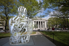 Jaume Plensa's "Alchemist" sits across Massachusetts Avenue facing MIT's main entrance.