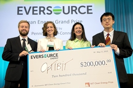 Optibit took home both grand prizes from the 2015 MIT Clean Energy Prize. Shown here are (from left) Optibit team members Mark Wade and Alex Wright; Penni McLean Conner of Eversource; and Optibit team member Chen Sun.