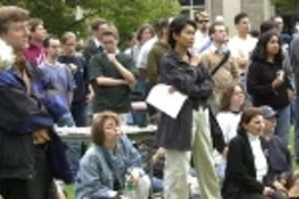 Attendees at Thursday's student-organized peace rally at MIT listen to a speaker.