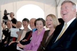 Laughing at the groundbreaking for the McGovern Institute are, seated from left: President Charles M. Vest; Dean of the School of Science Robert J. Silbey; Mrs. Ann Sharp; Phillip A. Sharp, professor of biology and director of the McGovern Institute for Brain Research; Mrs. Rebecca Vest; Lore Harp McGovern, and Patrick McGovern.