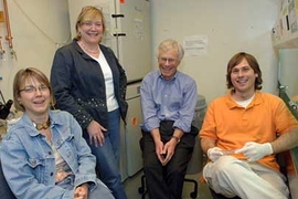 From left to right, Professors Linda Griffith and Leona Samson with Harvey Lodish of the Whitehead Institute, and graduate student Joe Shuga.