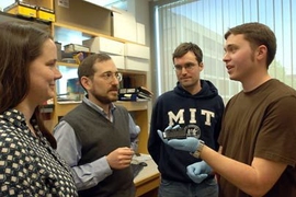 An MIT research team studying gene regulation in mouse and human liver cells has found that master regulatory proteins function differently in the two. From left, post-doc Robin Dowell, Professor Ernest Fraenkel,  graduate student Kenzie MacIsaac and research technician William Gordon discuss their research.