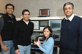 From left, electrical engineering graduate students Yogesh Ramadass, Naveen Verma and Joyce Kwong, along with Professor Anantha Chandrakasan. This team has developed a microchip that can be up to 10 times more energy-efficient than present technology.