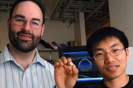 Michael Strano, associate professor of chemical engineering at MIT, and graduate student Chang Young Lee, right. Strano and his team have built a highly sensitive detector, here held by Lee, using carbon nanotubes that can sense very small quantities of neurotoxins.