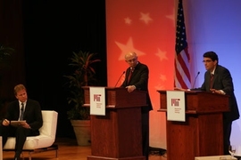 Representatives from the two presidential campaigns, R. James Woolsey, center, for Senator John McCain, and Jason Grumet for Senator Barack Obama, face off in a debate on energy policy held Monday night in Kresge Auditorium at MIT. NPR's Tom Ashbrook, left, moderated the debate.