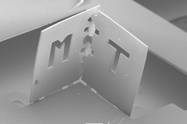 A team of MIT researchers folded this polymer sheet into one corner of a cube. The edge of each face is about 800 microns.