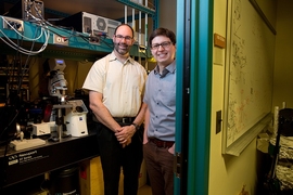 Professor Michael Strano (left) and postdoc fellow Juan Pablo Giraldo in their lab.