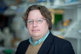 Michael T. Hemann, the Eisen and Chang Career Development Associate Professor of Biology in his lab at MIT.