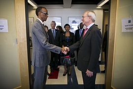 Rwandan president Paul Kagame (left) is greeted by MIT President L. Rafael Reif.