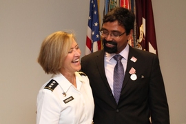 Jayakanth Srinivasan stands with Army Surgeon General Patricia Horoho after receiving the U.S. Army's Outstanding Civilian Service Medal on June 27.