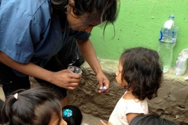 Lalani taught children how to use a toothbrushi while in Peru.