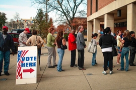 A line of voters stand at the end of a line with a two-and-a-half-hour wait to vote Nov. 3, 2008, in downtown Newark, Ohio.