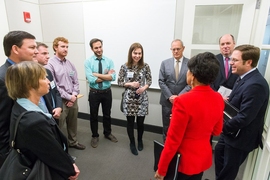 Pritzker meets with Professor Dina Katabi (center) and graduate students Zachary Kabelac (purple shirt) and Fadel Adib (green shirt), along with other officials, ahead of her remarks. Katabi, Kabelac, and Adib participated in the White House’s first annual "Demo Day" to promote innovation and entrepreneurship, presenting a wireless motion-tracking device they invented.