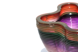 The ability to introduce variations in color into the stream of molten glass is one of the unusual properties of the new 3-D glass printing system.