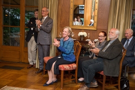 Hockfield with President L. Rafael Reif (standing, to her right) at the portrait's unveiling. 