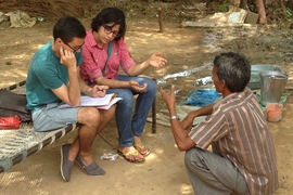 Eshita Dayani from the Indian Institute of Management-Ahmedabad and Jonars Spielberg from MIT CITE interview a local resident about his water quality and water filter usage in Ahmedabad, India.