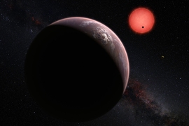 This artist’s rendering shows an imagined view of the three planets orbiting an ultracool dwarf star just 40 light-years from Earth that were discovered using the TRAPPIST telescope at ESO’s La Silla Observatory. In this view, one of the inner planets is seen in transit across the disc of its tiny and dim parent star.