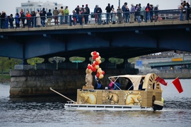 The “Bucentaur 2016” makes its way across the Charles River. 