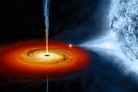 An artist's drawing of a black hole named Cygnus X-1. It formed when a large star caved in. This black hole pulls matter from the blue star beside it.
