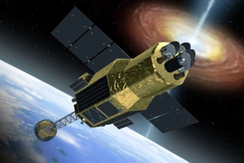 An artist’s rendition of Hitomi spacecraft in space.
