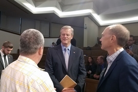 Governor Charlie Baker speaks with conference participants after his keynote address at the 2017 Online Learning Summit.