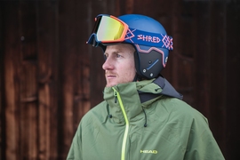 Ted Ligety wearing the helmet and goggle collection that Shred will be debuting at the Olympics. MIT students and faculty helped enhance the lens technology used in the lenses of these goggles.