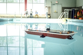 Researchers from MIT’s Computer Science and Artificial Intelligence Laboratory (CSAIL) and the Senseable City Lab have designed a fleet of autonomous boats that offer high maneuverability and precise control. The boats can also be rapidly 3-D printed using a low-cost printer, making mass manufacturing more feasible. The boats could be used to taxi people around and to deliver goods, easing stree...