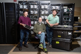 The core team of Haystack scientists who worked on the EHT project stand in front of the correlator at MIT’s Haystack Observatory.