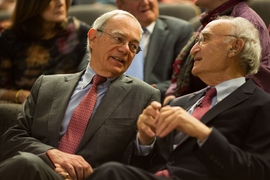Gerald Fink speaks with MIT President L. Rafael Reif before delivering his lecture.