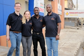 MDaaS Global co-founders in front of their clinic in Ibadan, Nigeria. From left to right: Joe McCord SM ’15, Genevieve Barnard Oni MBA ’19, Oluwasoga (Soga) Oni SM ’16, and Opeyemi Ologun.