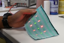 “From the outside it looks like a normal T-shirt, but from the inside, you can see the electronic parts which are touching your skin,” Dagdeviren says. “It compresses on your body, and the active parts of the sensors are exposed to the skin.”