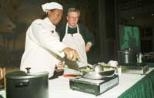 Dean for Graduate Students Ike Colbert (left) and Executive Vice President John Curry faced off last Friday night in the Iron Chefs Cookoff. Starting with the same basic ingredients, they concocted two very different dishes.