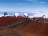 Mauna Kea Observatory: (Left to right): Subaru Telescope, twin domes of the Keck Telescopes, and the NASA Infrared Telescope Facility, which was used by Jim Elliot and Kelly Clancy during the occultation.
