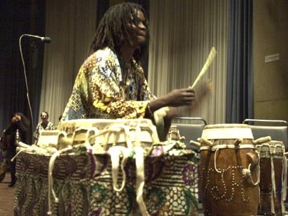 MIT resident artist and master Senegalese drummer Lamine Tour̩ will help lead 11 members of the musical group Rambax on a study tour of Senegal starting May 23. He is shown playing with Rambax, which performs Senegalese music.