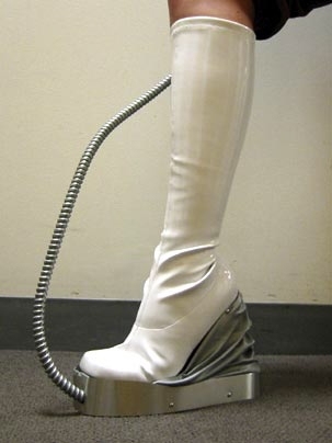 These bellow-heeled boots by graduate student Amanda Parkes are designed to pump out air as you walk. <a onclick="MM_openBrWindow('seamless-boot-enlarged.html','','width=509, height=583')">
<span onmouseover="this.className='cursorChange';">Open image gallery</span>
</a>
<noscript> <a href="seamless-boot-enlarged.html">
<em>(no JavaScript)</em>
</a>
</noscript>