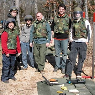 Students and instructors in MIT's Design for Demining course visit the U.S. Army's Demining Training Center in Missouri, in spring 2005. They are, from left, Helen Tsai, junior, mechanical engineering; Andrew Brooks, graduate student, EECS; Rosalind Takata, graduate student, mechanical engineering; instructors Andrew Heafitz and Benjamin Linder; and Aron Zingman, junior in mechanical engineering.