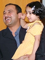 Graduate student Vineet Thuvara, one of this year's Patrick J. McGovern '59 Entrepreneurship Award winners, with his daughter.