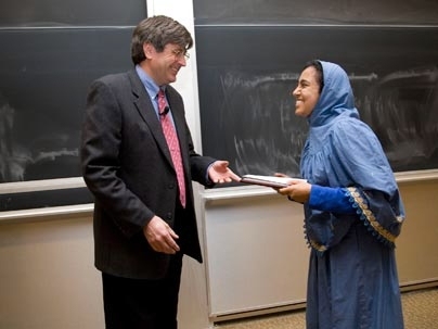 Department Head Klavs Jensen presents the Edward W. MerrillOutstanding Teaching Assistant Award to Jamila Saifee.