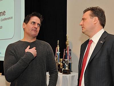 Dallas Mavericks owner Mark Cuban, left, speaks with Houston Rockets General manager Daryl Morey MBA '00, right, during the MIT Sloan Sports Analytics Conference.