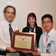 Dr. Jones receives his award at the Harvard Medical School
