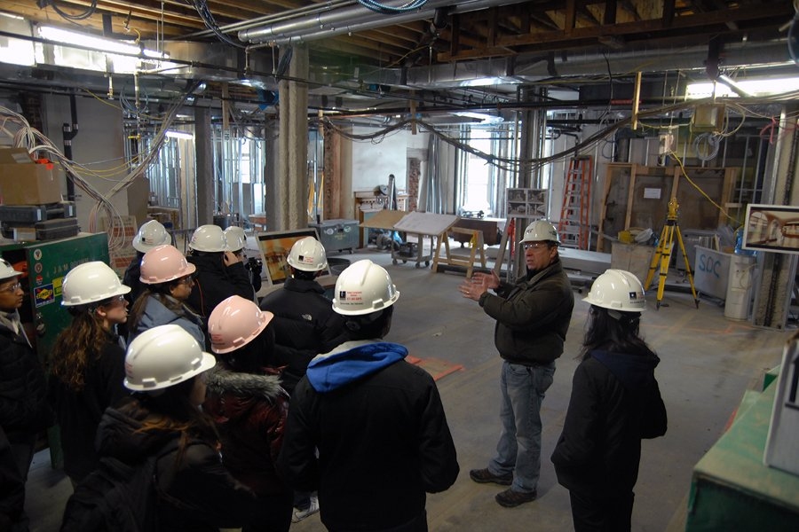 Maseeh Hall Housemaster Jack Caroll talks to a tour about the new Maseeh dining hall, which will be a state of the art facility that serves not only the dorm's residents but the larger campus community, as well.