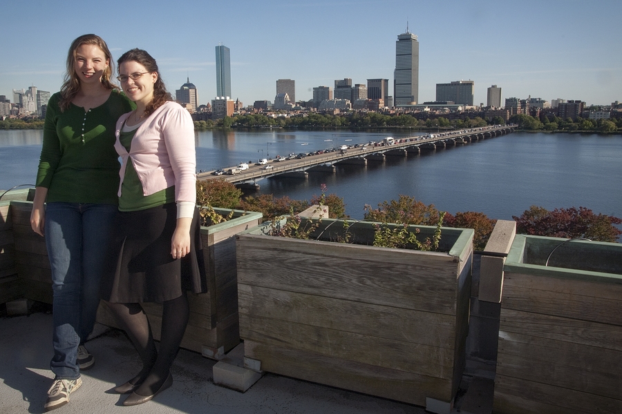 Graduate Resident Tutors Melinda Hale and Bridget Wall bask in the early autumn sun in their McCormick Hall garden. The East Penthouse rooftop was once abandoned, but the pair has transformed the Boston-facing patio into an urban oasis.