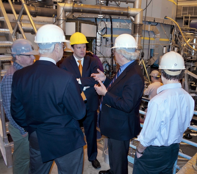 Congressman Chris Murphy (in yellow hard hat) listens to MIT alumnus Reiner Beeuwkes during his visit to the Alcator C-Mod cell. He was also accompanied by PSFC Director Miklos Porkolab (foreground left), Alcator Project Head Earl Marmar and Associate Director Martin Greenwald (foreground right).