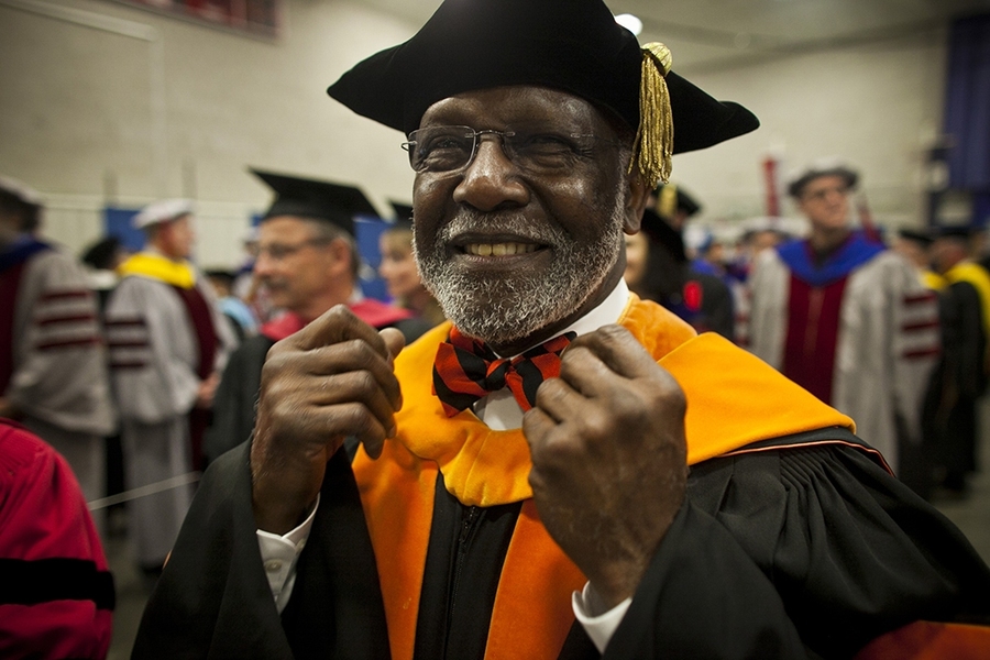 Wesley L. Harris, the Charles Stark Draper Professor of Aeronautics and Astronautics, prepared for the ceremony.