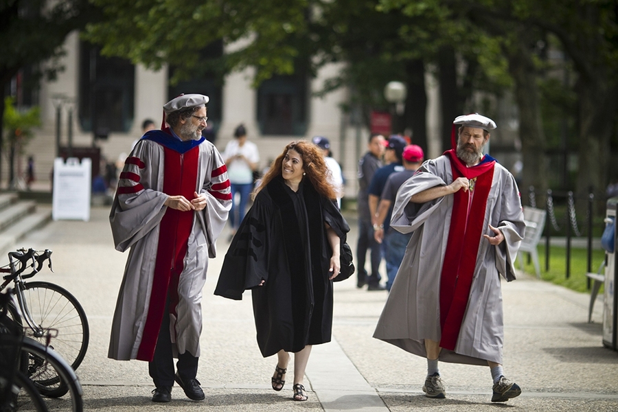 The doctoral hooding ceremony is traditionally held a day before Commencement.