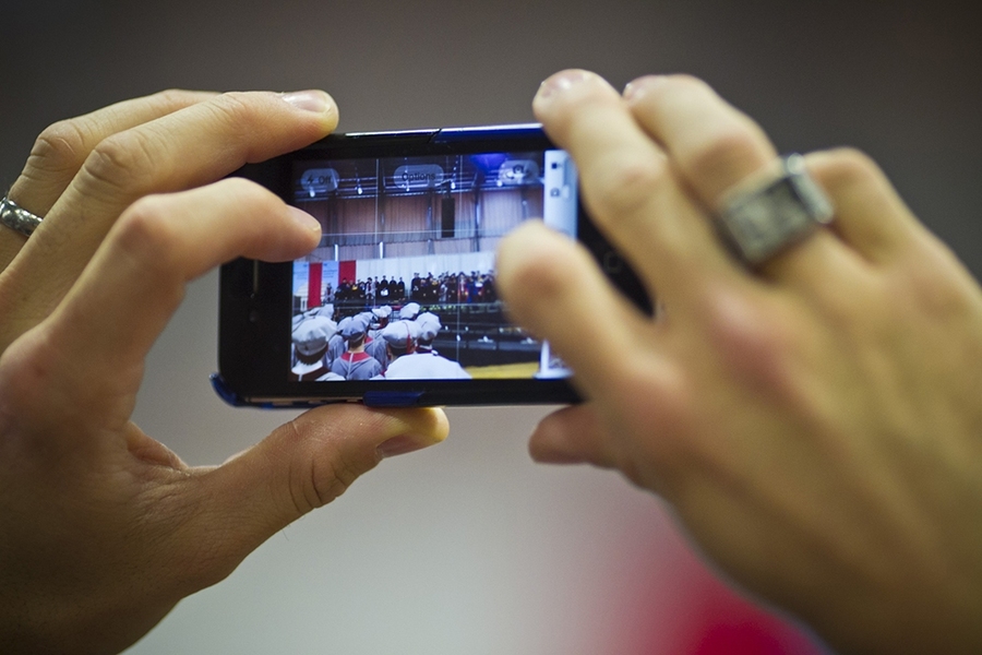 Audience members captured the moment on their smartphones, digital cameras and tablets.