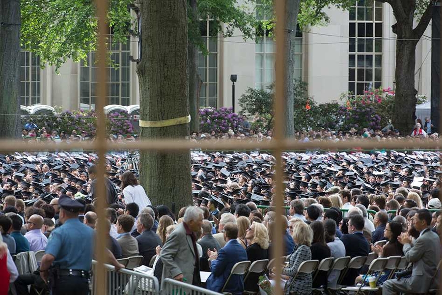Crowd of seated attendees at MIT commencement